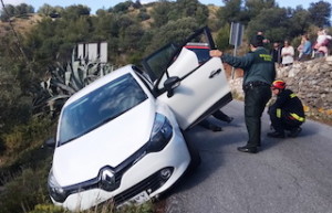 LHR Car hangs off side of road