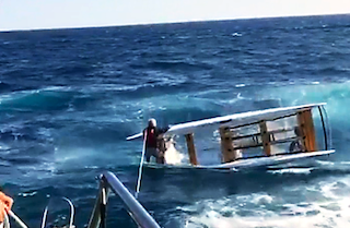 SPN Rescuing a man in a boat