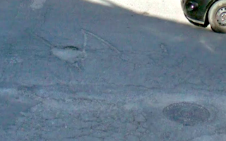 ALM Jete Damaged Road Surface