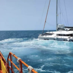 MOT Sinking Catamaran Taken Under Tow