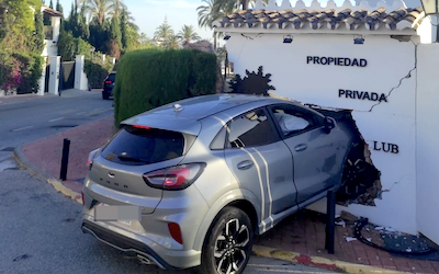 AND Car sticking out of Wall